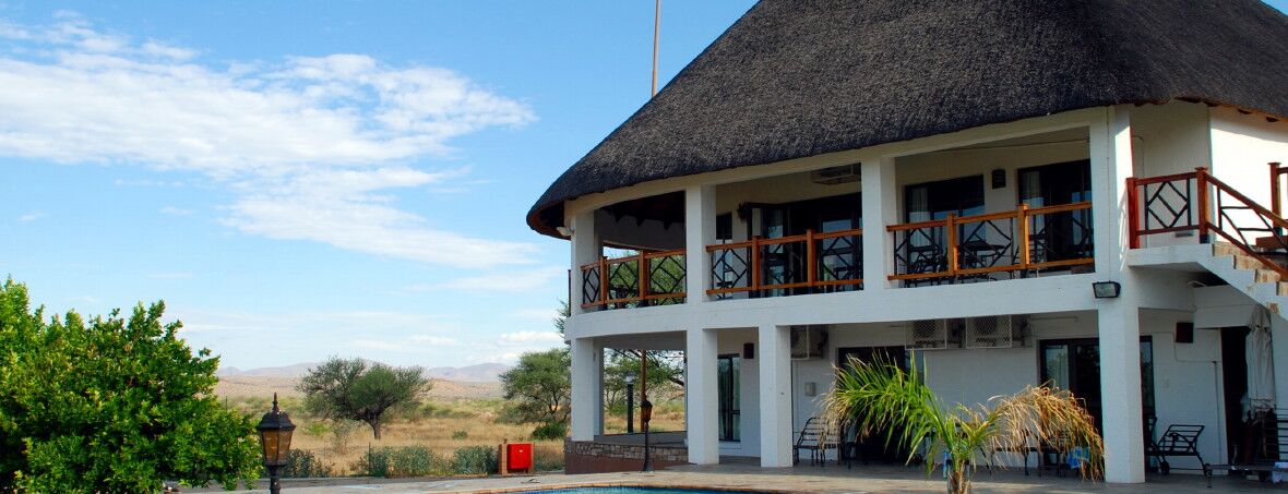Thatched lodge with balconies